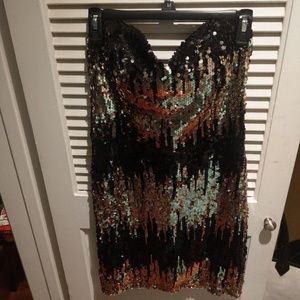 Black and gold sequin dress